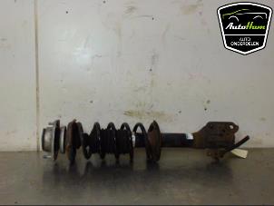 Used Fronts shock absorber, left Daihatsu Cuore (L251/271/276) 1.0 12V DVVT Price € 25,00 Margin scheme offered by AutoHam