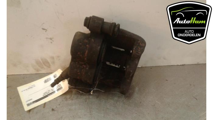 Front brake calliper, left from a Renault Master III (FD/HD) 2.5 dCi 16V 2005