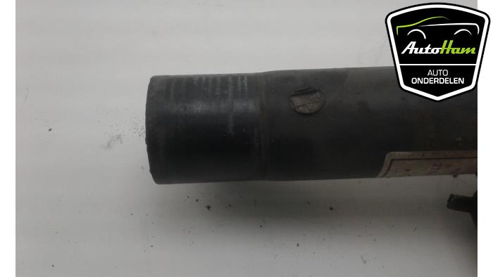 Fronts shock absorber, left from a Ford Transit Connect 1.8 Tddi 2003