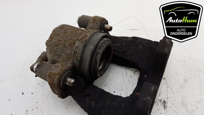 Front brake calliper, left from a MINI Mini Cooper S (R53) 1.6 16V 2005