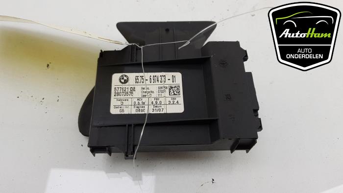 Alarm module from a BMW 3 serie (E90) 318i 16V 2008
