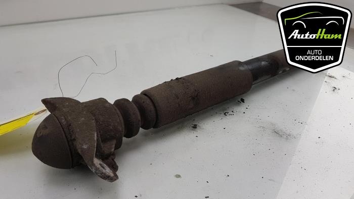 Rear shock absorber, left from a Volkswagen Scirocco (137/13AD) 2.0 TDI 16V 2011