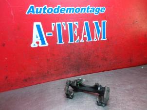 Used Front brake calliperholder, left Volkswagen Caddy Combi III (2KB,2KJ) 1.2 TSI Price on request offered by A-Team Automotive Rotterdam