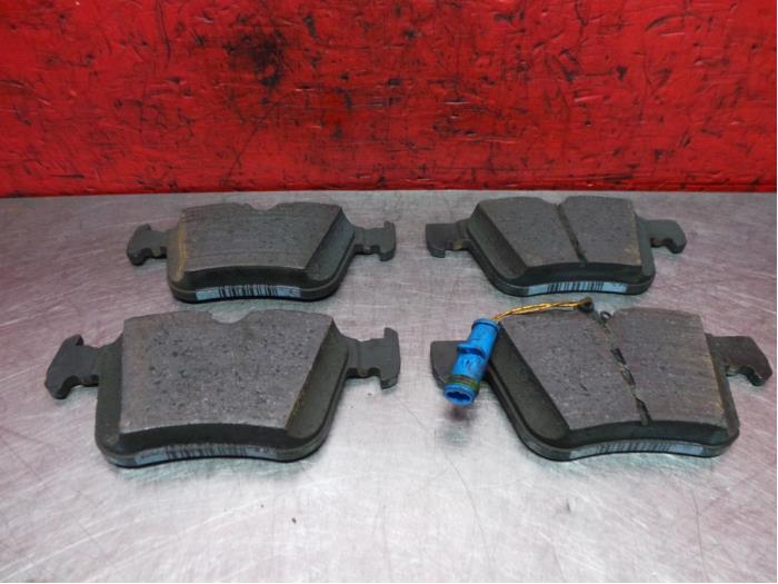 Rear brake pad from a Mercedes-Benz C (W205) C-180 1.6 16V 2018