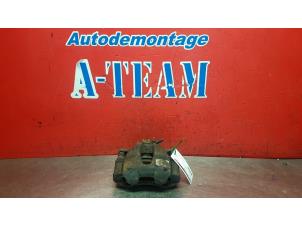 Used Front brake calliper, left Peugeot 308 (4A/C) 1.6 VTI 16V Price on request offered by A-Team Automotive Rotterdam