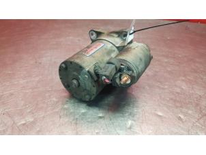 Anlasser van een Kia Rio (DC12) 1.3 2004