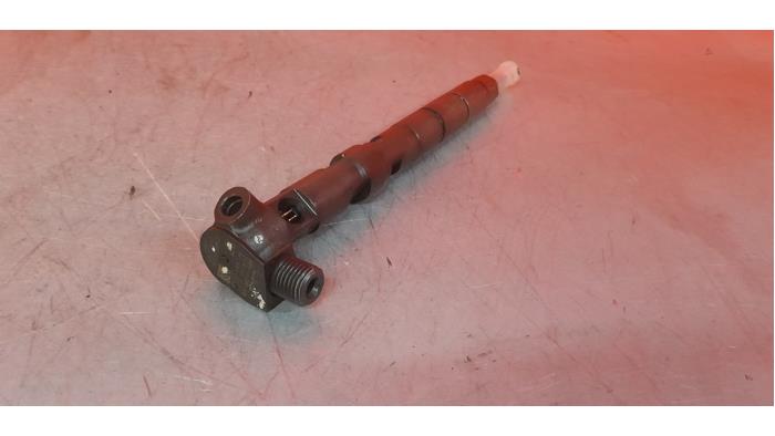 Injector (diesel) from a Volkswagen Polo V (6R) 1.2 TDI 12V BlueMotion 2011