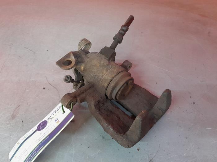 Rear brake calliper, left from a Volkswagen Transporter T5 2.5 TDi 2005