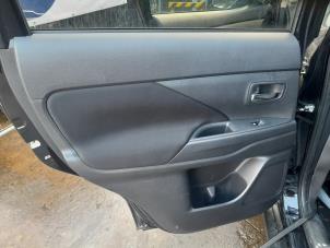 Used Rear door trim 4-door, left Mitsubishi Outlander (GF/GG) 2.0 16V 4x2 Price on request offered by A-Team Automotive Rotterdam