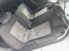 Cinturón de seguridad centro detrás de un Volkswagen Polo V (6R) 1.2 TDI 12V BlueMotion 2011
