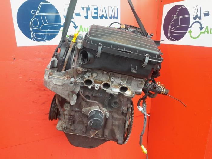 Motor de un Daihatsu Cuore (L251/271/276) 1.0 12V DVVT 2007