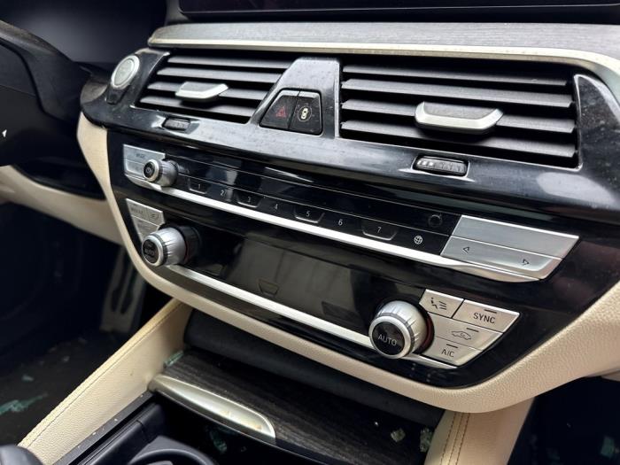 Używane Panel climatronic BMW 5 serie (G30) 545e xDrive Cena € 799,99 Procedura marży oferowane przez A-team Automotive