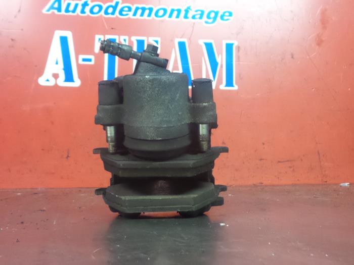 Front brake calliper, left from a Seat Mii 1.0 12V 2014
