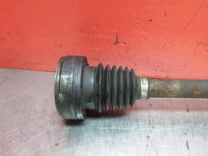 Front drive shaft, left from a Seat Ibiza II Facelift (6K1) 1.4 16V 2001