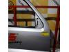 Puerta 2 puertas derecha de un Suzuki Jimny Hardtop 1.3i 16V 4x4 2000