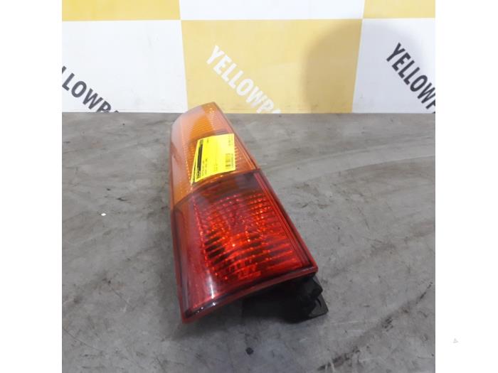 Taillight, left from a Suzuki New Ignis (MH) 1.5 16V 2004