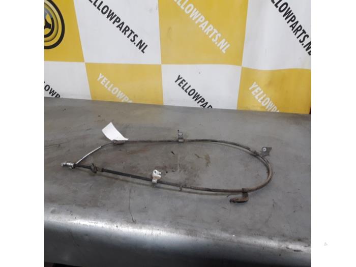 Usagé Câble frein à main Suzuki Swift (ZA/ZC/ZD) 1.2 16V Prix € 25,00 Règlement à la marge proposé par Yellow Parts