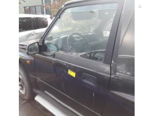 Used Door 2-door, left Suzuki Vitara (ET/FT/TA) 1.6 Price € 75,00 Margin scheme offered by Yellow Parts