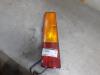 Taillight, left from a Suzuki New Ignis (MH) 1.5 16V 2005