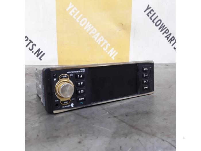 Radio van een Suzuki Swift (ZA/ZC/ZD1/2/3/9) 1.3 DDis 16V 2006