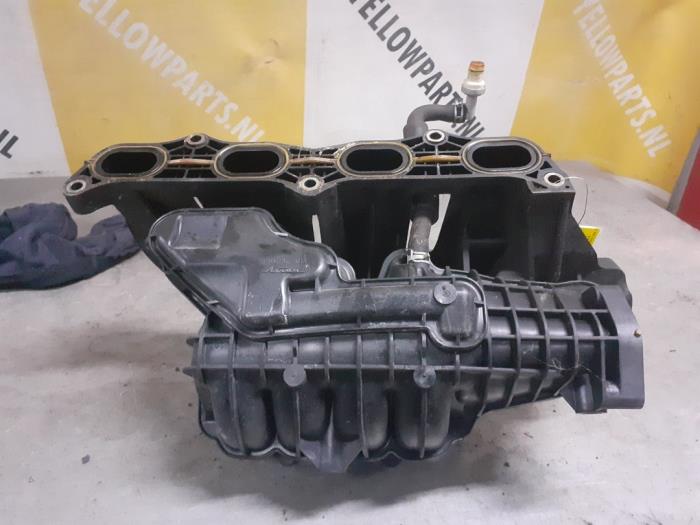 Intake manifold from a Suzuki New Ignis (MH) 1.5 16V 2005