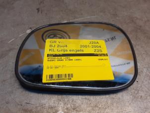 Used Mirror glass, left Suzuki Grand Vitara I (FT/GT/HT) 2.0 16V Price € 20,00 Margin scheme offered by Yellow Parts
