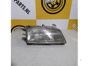 Used Headlight, right Suzuki Swift (SF310/413) 1.3i 5-Drs. Price € 29,00 Margin scheme offered by Yellow Parts