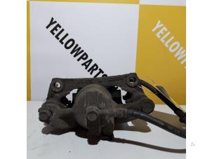 Used Front brake calliper, left Suzuki Swift (SF310/413) 1.3 Price € 25,00 Margin scheme offered by Yellow Parts