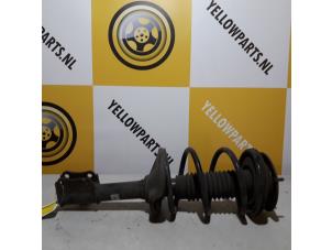 Gebrauchte Stoßdämpferstrebe links vorne Suzuki Liana (ERC/ERD/RH4) 1.6 MPi 16V Preis € 40,00 Margenregelung angeboten von Yellow Parts