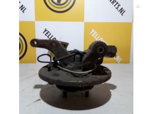 Used Knuckle bracket, rear right Suzuki Liana (ERC/ERD/RH4) 1.6 MPi 16V Price € 35,00 Margin scheme offered by Yellow Parts