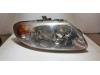Headlight, right from a Chrysler Voyager/Grand Voyager 2.4i 16V 1996