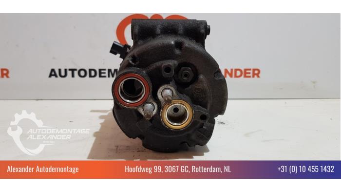 Air conditioning pump from a Ford Mondeo IV 1.8 TDCi 100 16V 2010