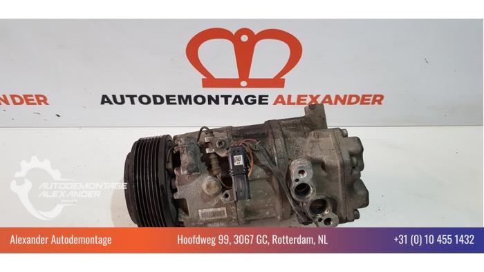 Air conditioning pump from a BMW 1 serie (E81) 118i 16V 2010