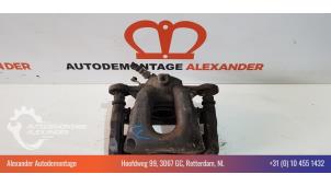 Used Front brake calliper, left BMW 1 serie (E81) 118i 16V Price € 40,00 Margin scheme offered by Alexander Autodemontage