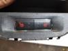 Interruptor de calefactor de asiento de un Ford Fiesta 6 (JA8) 1.0 EcoBoost 12V 125 2013