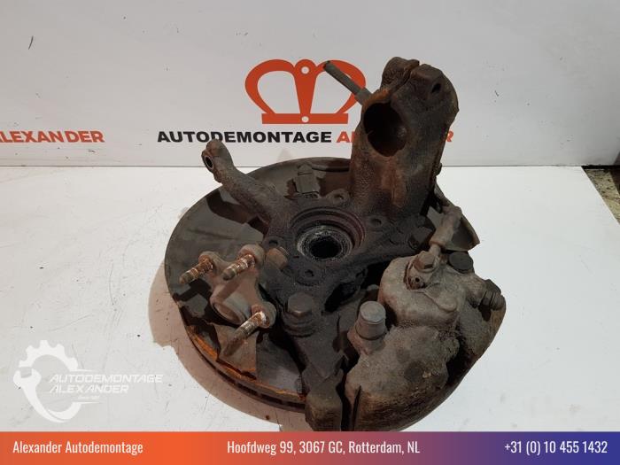 Knuckle, front left from a Volkswagen Eos (1F7/F8) 2.0 TDI DPF 2007