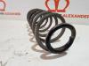 Rear coil spring from a Renault Megane III Grandtour (KZ) 1.5 dCi 110 2012