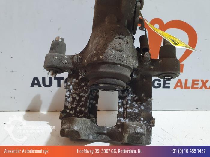 Rear brake calliper, left from a Peugeot 308 SW (L4/L9/LC/LJ/LR) 1.6 BlueHDi 115 2015
