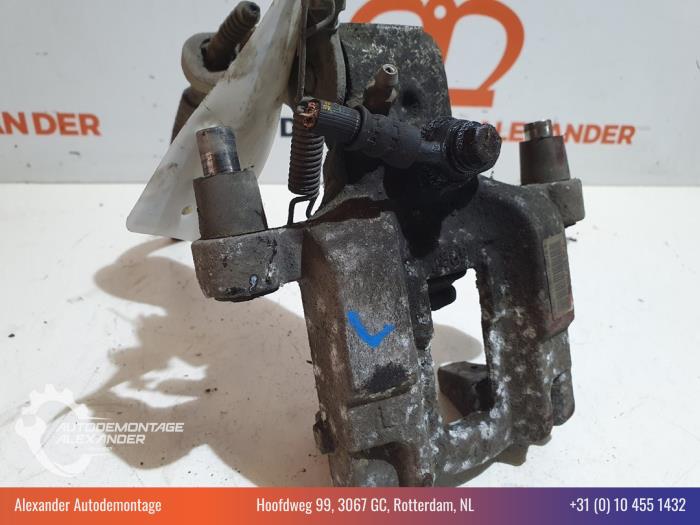 Rear brake calliper, left from a Peugeot 308 SW (L4/L9/LC/LJ/LR) 1.6 BlueHDi 115 2015