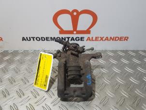 Used Rear brake calliper, left Opel Astra J GTC (PD2/PF2) 1.4 16V ecoFLEX Price € 80,00 Margin scheme offered by Alexander Autodemontage