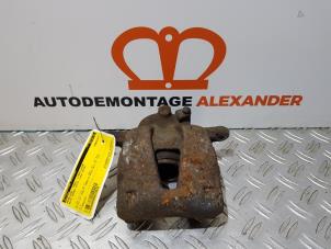 Used Front brake calliper, left Alfa Romeo MiTo (955) 1.3 JTDm 16V Price on request offered by Alexander Autodemontage