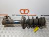 Fronts shock absorber, left from a Honda Civic (FA/FD) 1.3 Hybrid 2008