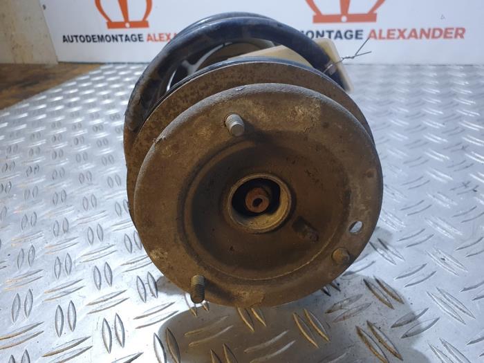 Fronts shock absorber, left BMW 5 serie 528i 24V - 31311096857