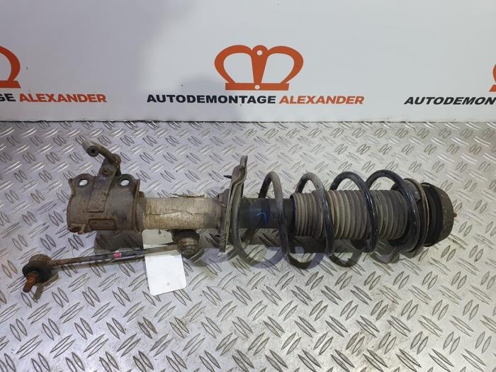 Fronts shock absorber, left from a Kia Picanto (TA) 1.0 12V 2012