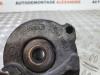 Timing belt tensioner from a Opel Astra H Twin Top (L67) 1.6 16V 2007