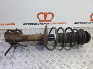 Used Fronts shock absorber, left Toyota Yaris II (P9) 1.3 16V VVT-i Price on request offered by Alexander Autodemontage