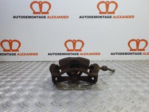 Used Front brake calliper, left Chevrolet Aveo (250) 1.2 16V Price on request offered by Alexander Autodemontage