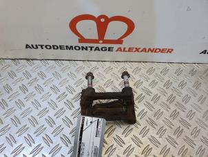 Used Rear brake calliperholder, left Opel Astra H Twin Top (L67) 1.6 16V Price on request offered by Alexander Autodemontage