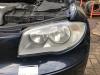 Headlight, left from a BMW 1 serie (E87/87N), 2003 / 2012 116i 1.6 16V, Hatchback, 4-dr, Petrol, 1.596cc, 85kW (116pk), RWD, N45B16A, 2004-06 / 2006-12, UF11; UF12 2006