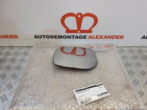 Used Mirror glass, left Toyota Yaris II (P9) 1.3 16V VVT-i Price on request offered by Alexander Autodemontage